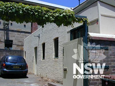 View looking south of the brick outbuilding to Millers Point Post Office and the fibre cement and weatherboard northern end addition.