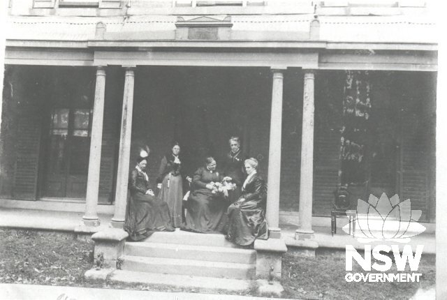 Stanmore House c.1911. Thought to show members of the Pemell and Henry families on the front steps. East wing has been demolished.