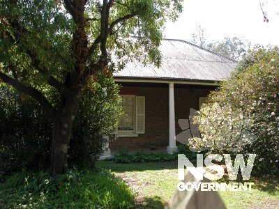 Roseneath Cottage, South wall with verandah and garden.