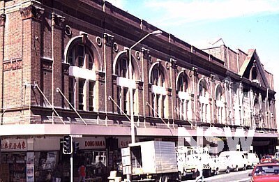The New Belmore Markets as it was called was designed by George McRae and the facade presented thirty-six arched bays to the streets: eleven to Campbell and Hay and seven to Parker and Pitt.  The markets opened in July 1893.
