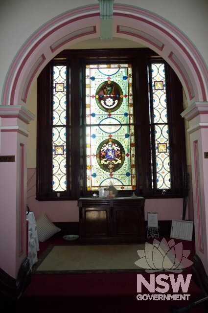 Interior arch and stained glass window