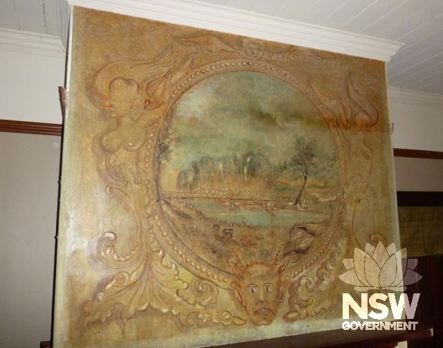 Historic mural, recently uncovered and restored, located in the main public meeting room of the Bridge View Inn, above the fireplace.