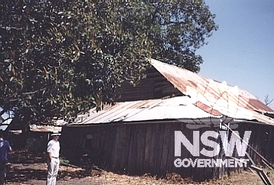 View of farm building.  The split timber slab farm buildings are rare surviving examples of rude timber construction in the Sydney Region.