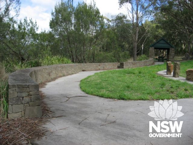Picnic area showing Depression era structure (background) and modern landscaping