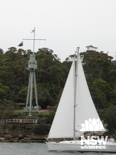 The HMAS Sydney Memorial mast from the harbour on top of the 1839 fort