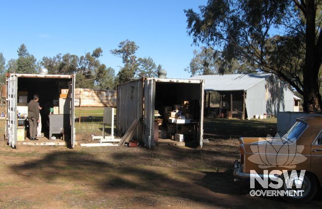 Shipping containers with family records held on site