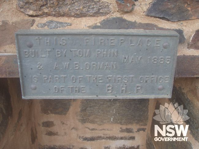 Plaque detailing the builders of the BHP Fireplace and year of construction