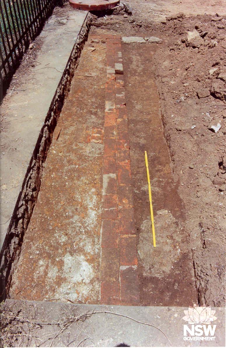 Sandstock brick footing uncovered during archaeological testing by Casey and Lowe Pty Ltd in 2003