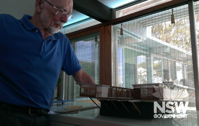 Dr Lyons pictured with the architectural model of his house, which he made c.1967 based on the original Boyd-Romberg drawings for Lyons House.