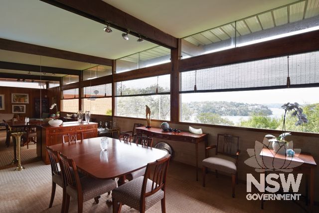 Dining Room at Lyons House showing view towards the Port Hacking River and Royal National Park. Note Marion Hall Best matchstick curtains with curtain holders.