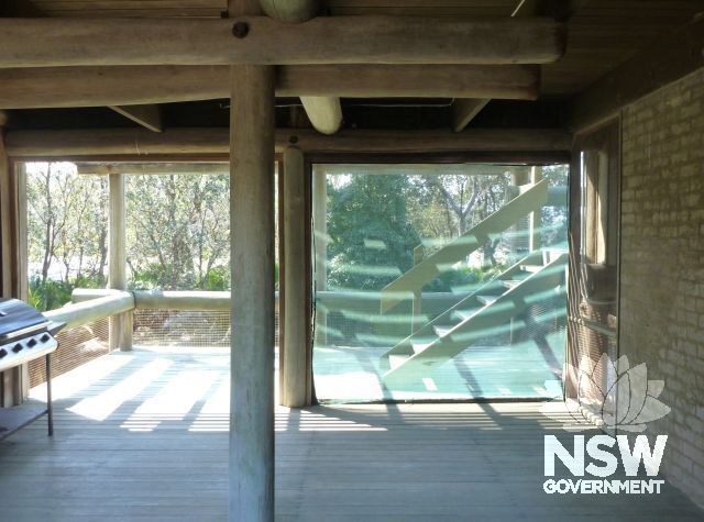 Baronda - outdoor room near ground level, showing original concept for house to be built wiithout stringy bark wall panels