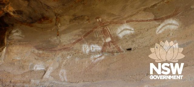 Traditional painting of larger than life-size figure in Baiame Cave, Milbrodale, thought to depict Baiame the creator