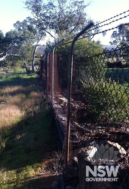 Original fencing around site, dating from World War II, 2014