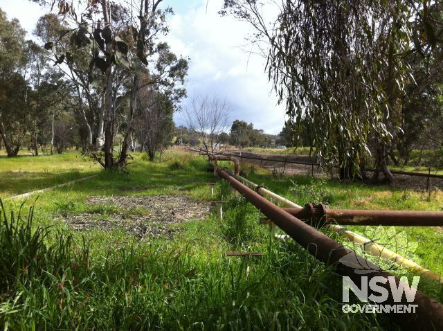 Remnants of original rail siding acroos road from the site. This is being demolished because of contamination issues, and is not being included in the listing, although it was an integral part of the functioning of the site.