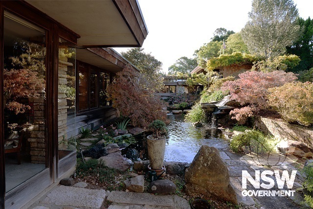 Koi Pond and waterfall at front of residence
