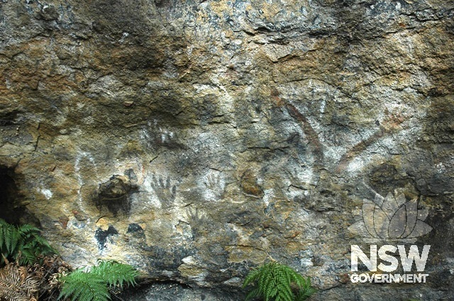 White ochre stencil hands and boomerang, Blackfellows Hand Cave