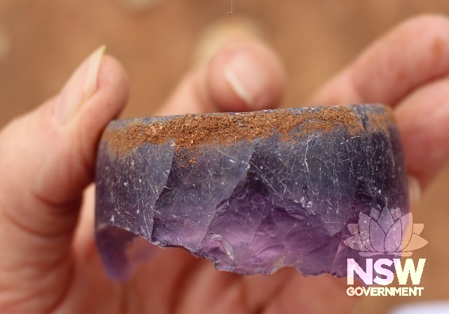 purple glass Aboriginal wood working artefact found at Mount Drysdale Village