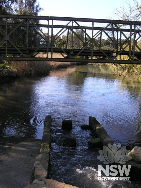 Footbridge over Wolli Creek at Western end of Henderson Street showing fish way