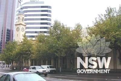View of Northeastern Facade, which includes the Court House and Police Station, also showing North Sydney CBD context and street plantings.