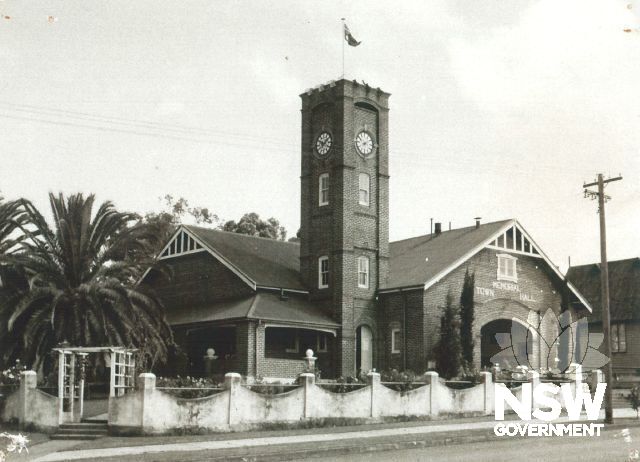 Historic view of the Wingham Memorial Town Hall showing the original fencing still in place
