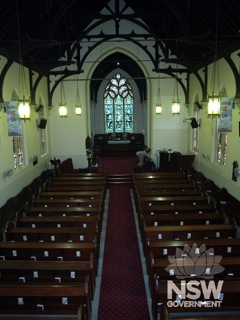 Interior of St John's Anglican Church looking towards chancel from organ loft