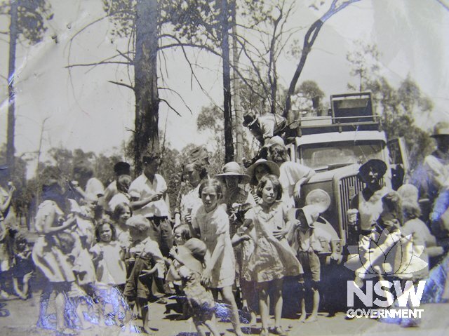 Group of Wooleybah residents in 1937. Original photo by Tim Keady taken to lobby for a school at Wooleybah. Photo of State Archives photo.