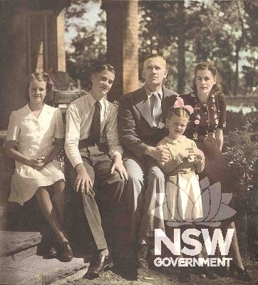 Portrait of Evatt family seated on the steps to the front verandah of Evatt House, April 1945 (from left: Elizabeth, Clive Jnr, Clive Snr, Penelope and Marjorie Evatt)