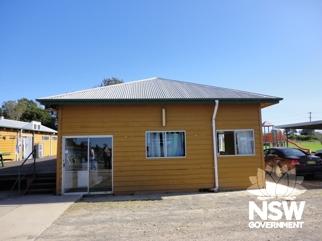 School building. All weather end of the building has been enclosed.