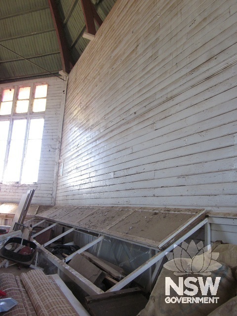 Narrandera Showground Industrial Hall. Interior, showing glass display cabinet fixed to wall.