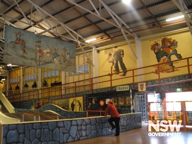 Interior Coney Island showing slide and murals