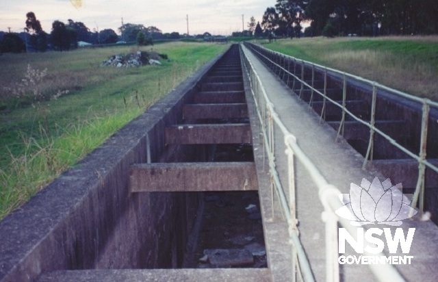 1903 Sedimentation Chambers, west of Pipehead. Taken in 2000 when the Lower Canal was decomissioned and drained but not infilled.