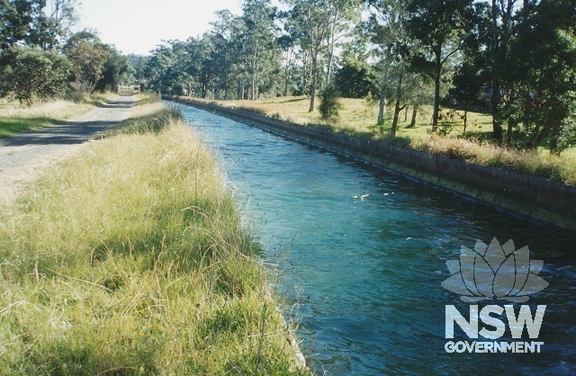 The functioning Lower Canal in 1994 with the gravel access path to its south.