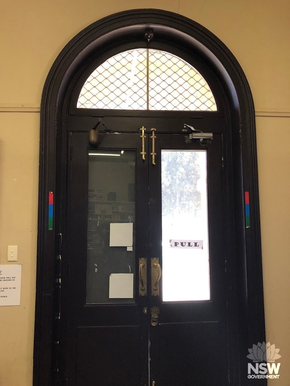 post office entrance door and arched fan light