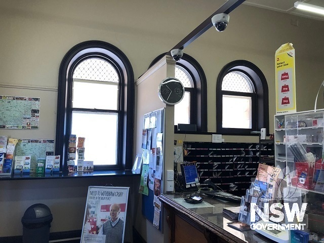 Inside of post office showing original arch headed windows