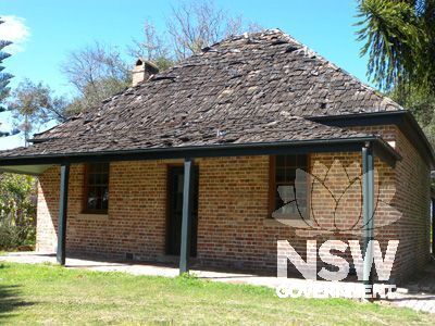 Denham Court house - 1982 brick games room built in Victorian Georgian style with timber shingled roof - east elevation