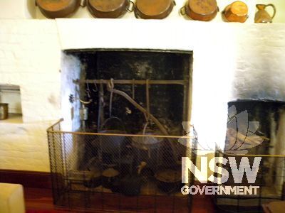 Denham Court house:  kitchen interior - fireplace