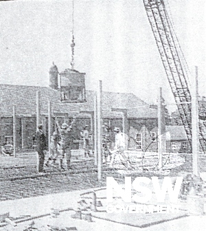 Mr Grouse inspects construction of new arts block 1965
