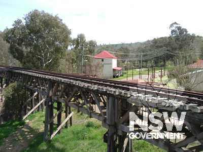 Gundagai Rail Bridge, crossing near Morley's Creek with the old Four Mill in the backround, looking southwest