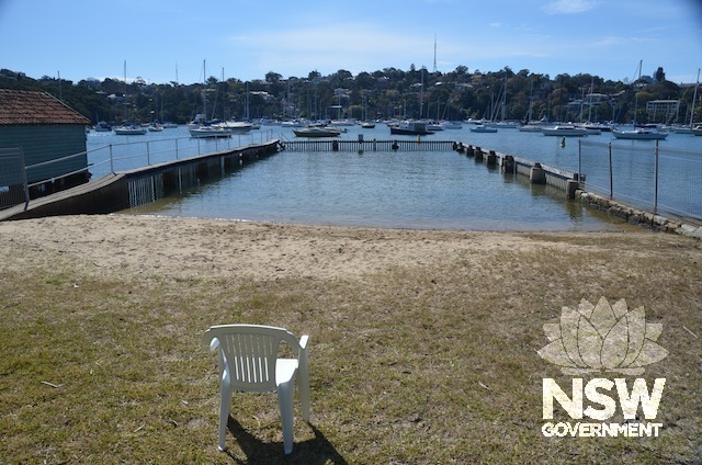 View of Lucretia Baths, a rare  example of a timber paling harbourside pool, from Dunois Street looking north east.