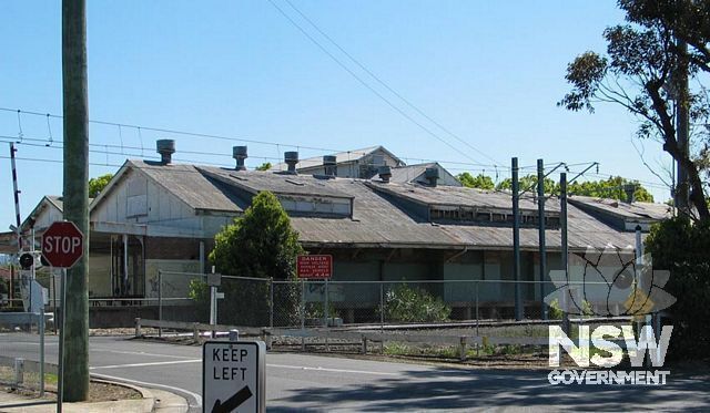 Illawarra Cooperative Central Dairy. View from east across railway level crossing