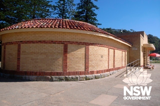 The Change Room and Toilets - showing curved wings and polychromatic brickwork.