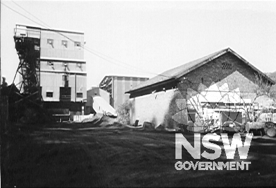 Porter and winder house, Coal storage and washery. Brick building, steel framed buildings clad in corrugated metal, exposed steel structure and machinery.