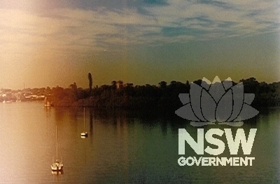 Thomas Walker Convalecense Hospital. View from Ryde Bridge across the Parramatta River. The tower projects from the mangrove fringe of the extensive site.