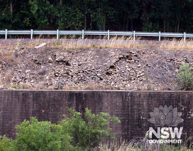 Railway and road infrastructure, such as these dry stone retaining walls in need of restoration, are important features of the Area.