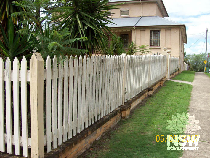 The fence and grounds of Windsor Courthouse.