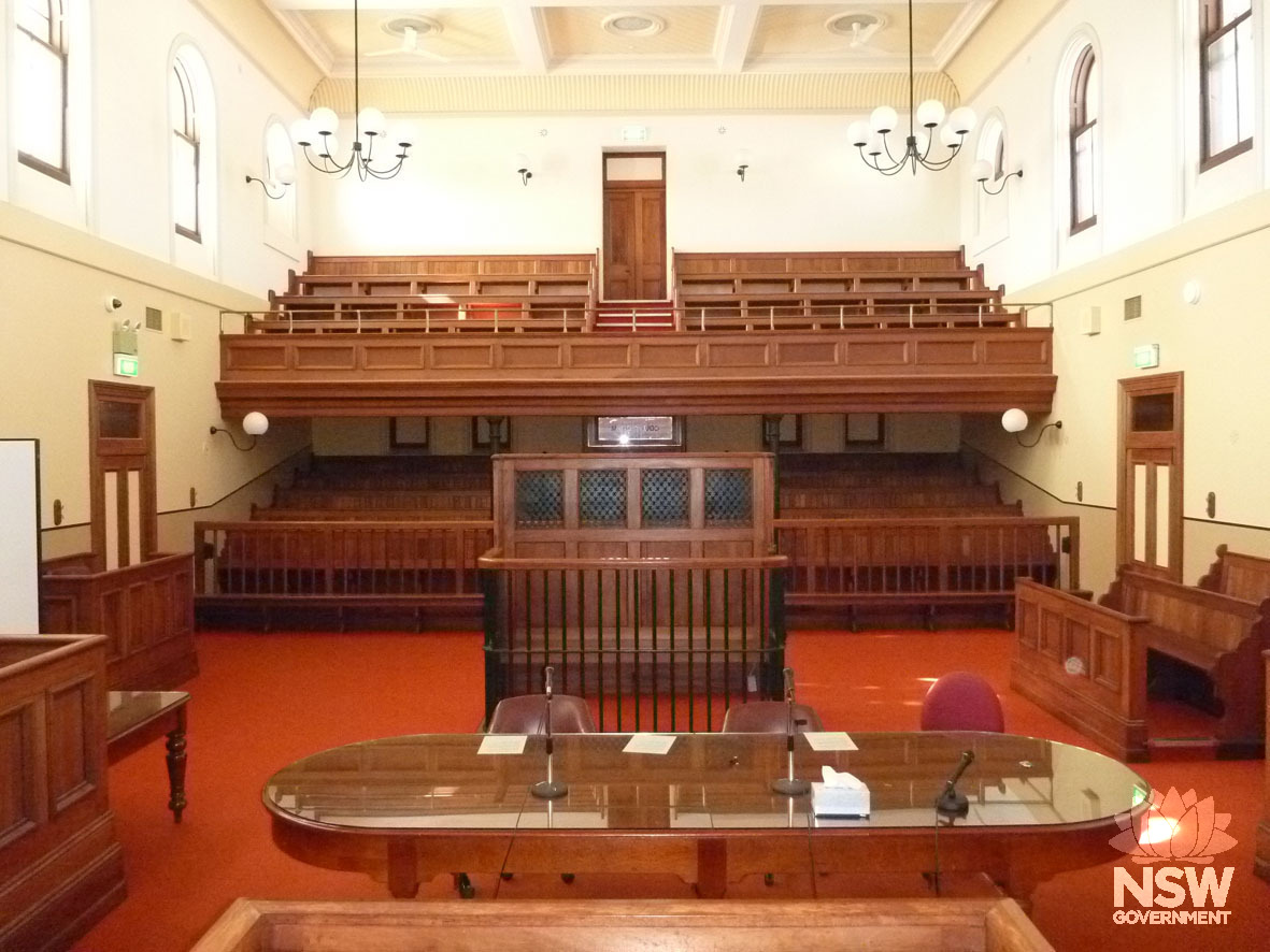 The courtroom of Dubbo Courthouse, showing public gallery and prisoner dock.