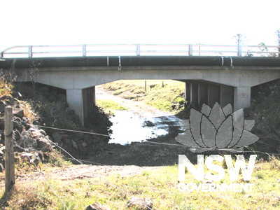 View north showing attached pipe. Note tht bridge is used for farm access under road