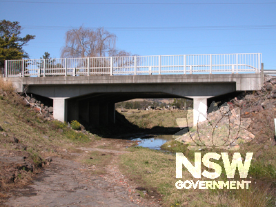 View south of widened bridge showing walkway side