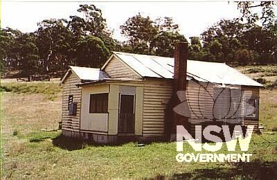 Weatherboard cottage.