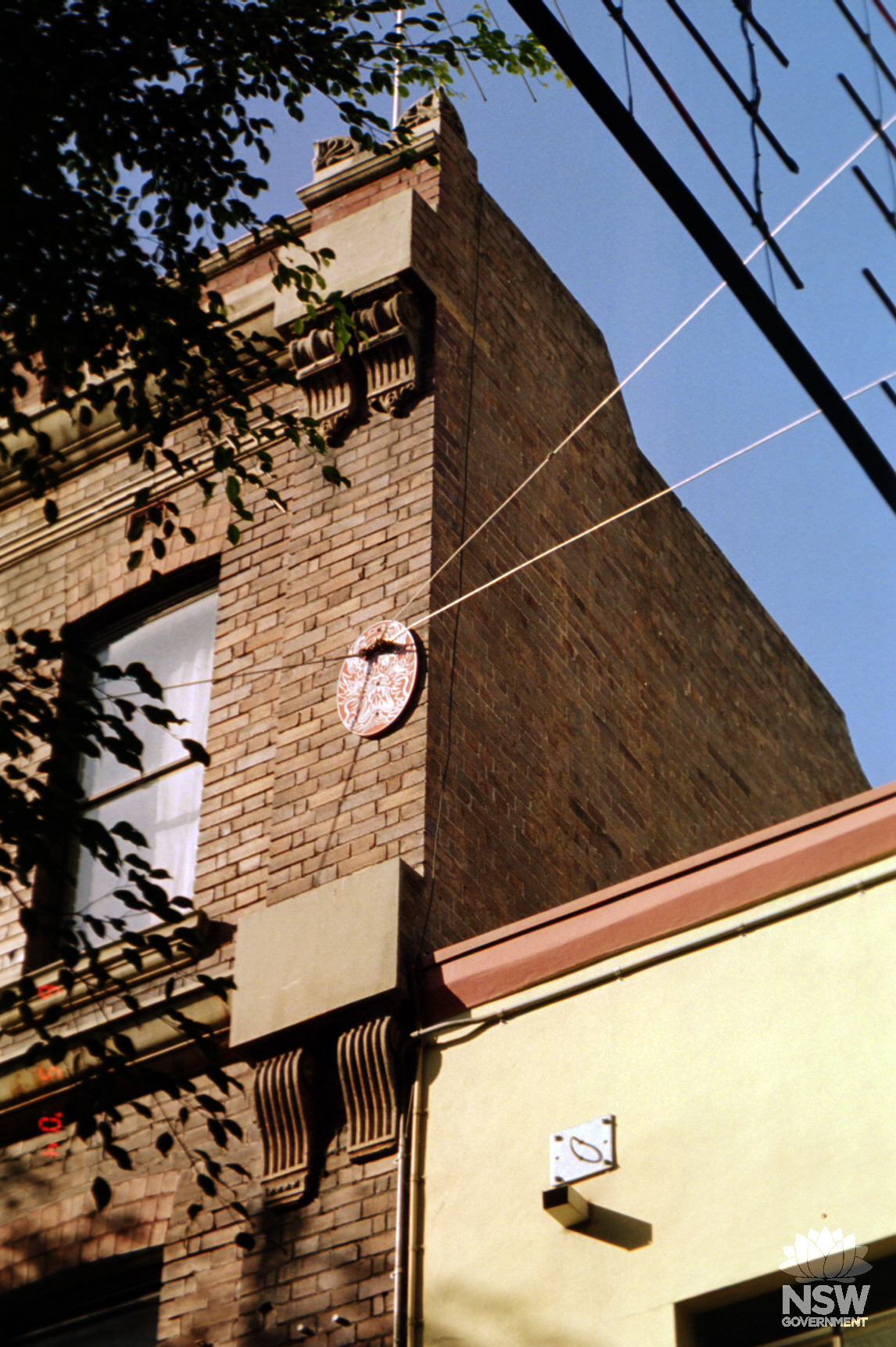 Some decorative details on the façade of Kwong War Chong Building.